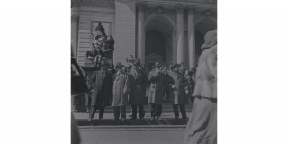 Historic photo of a crowd outside of the Stephen A. Schwarzman Building