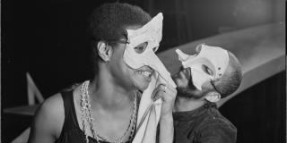 Maya Angelou and Charles Gordone (in masks) in the stage production "The Blacks"